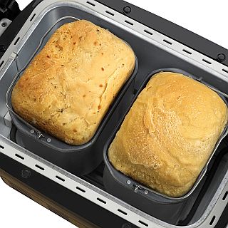 Image shows side-by-side 1-pound loaf pans of Breadman BK2000B